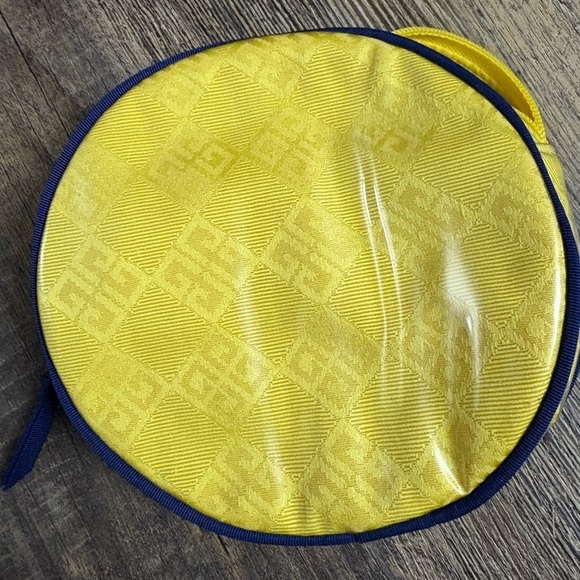 Givenchy Handbags - Amarige de Givenchy Yellow Navy Cosmetic Travel Pouch Round Zip Bag